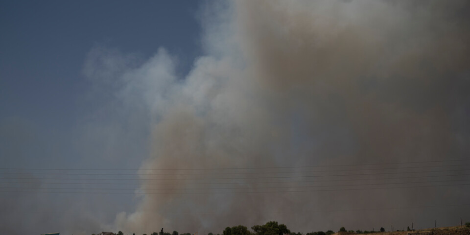 Rök stiger mot himlen efter en attack mot Israelannekterade Golanhöjderna tidigare i juni.