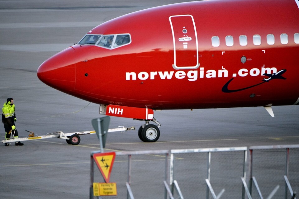 Det norska lågprisflygbolaget Norwegian, med sex av 140 flygplan i trafik i coronapandemin, har varnat för att kassan är tom i början av 2021 om det inte kommer in mer kapital eller nödlån. Arkivbild