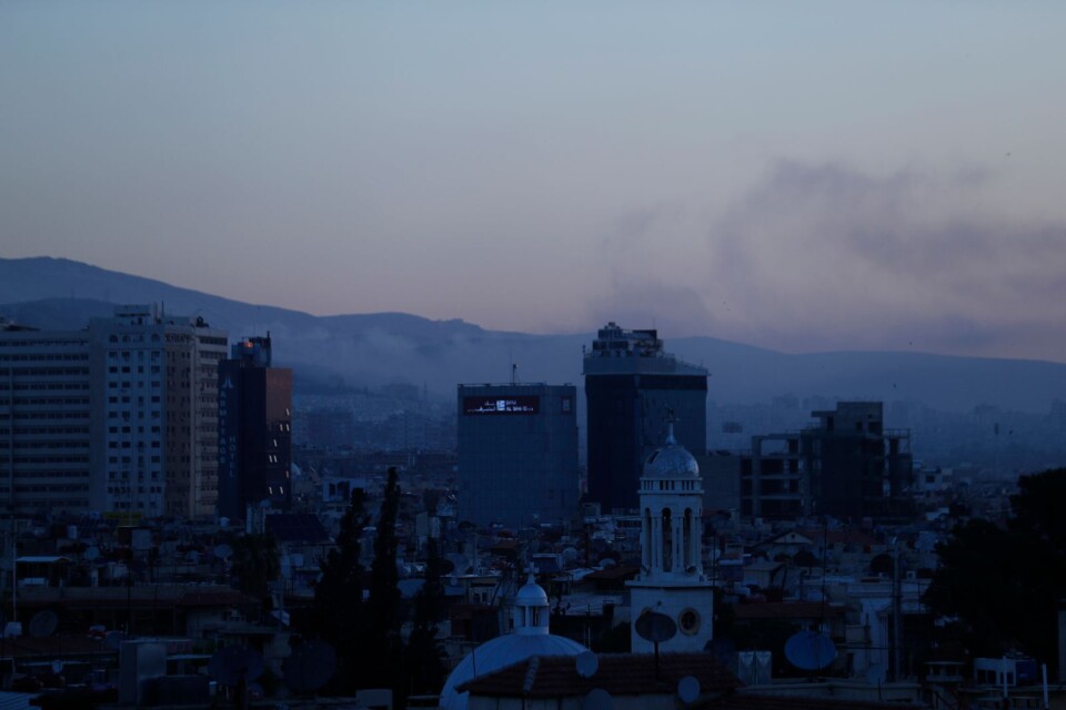 Rök från områden i Damaskus efter attacken.