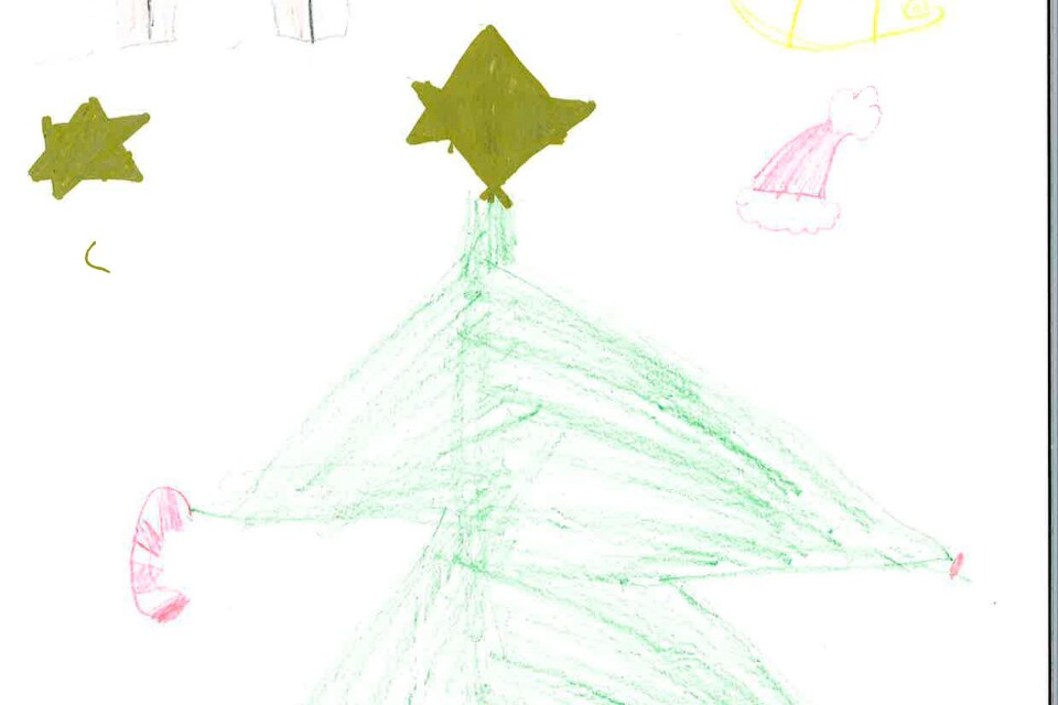 Joel, 8 år,  har tecknat en julgran.