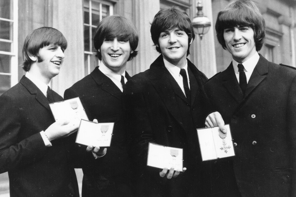 The Beatles – Ringo Starr, John Lennon, Paul McCartney och George Harrison – fotograferade i London 1965. Arkivbild.