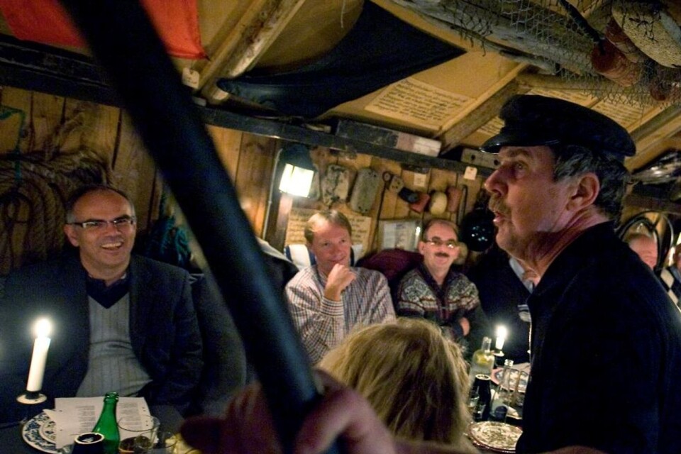 The oldest eel huts date back to the 18th century. And Ålagille (an eel party) is an ancient tradition, a party where you eat different eel dishes. Ålagille is held in the autumn. Here, with Hånsa Olofsson in Tvillingaboden. Stock Image.