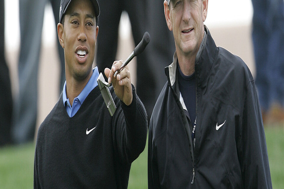 Tiger Woods och hans förre tränare Hank Haney. Arkivbild.