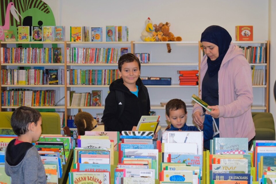 Nezha Ait Qajja chooses books for her children. Bilal Bellati thinks books are fun.