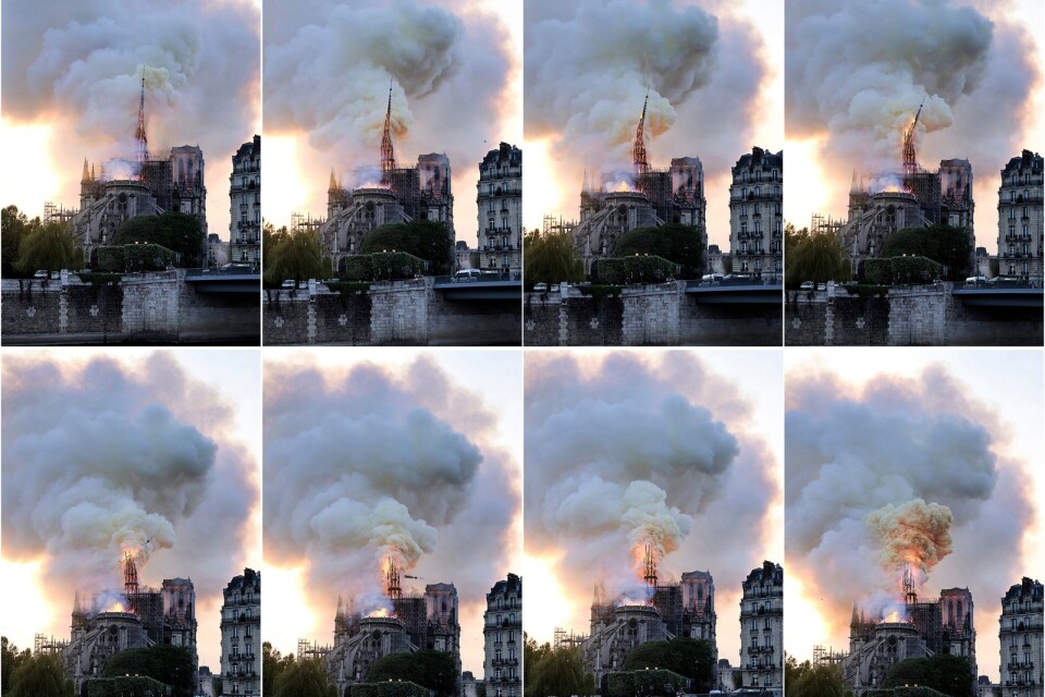 Bilden visar hur kraftig rök steg mot himlen, och hur lågor slog ut från byggnaden i centrala Paris.