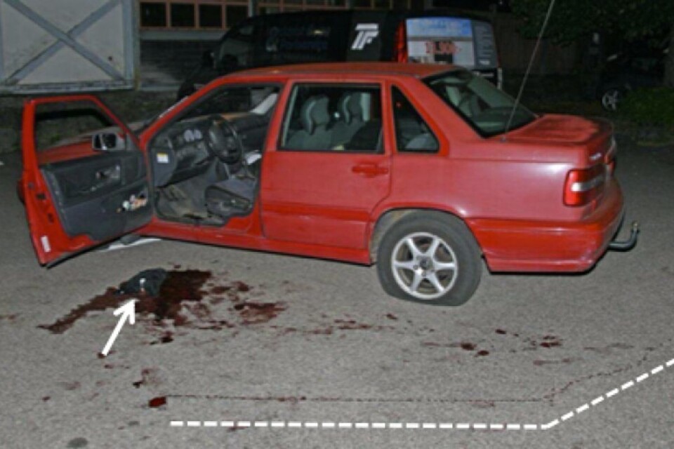 There were large pools of blood both inside and outside the car.