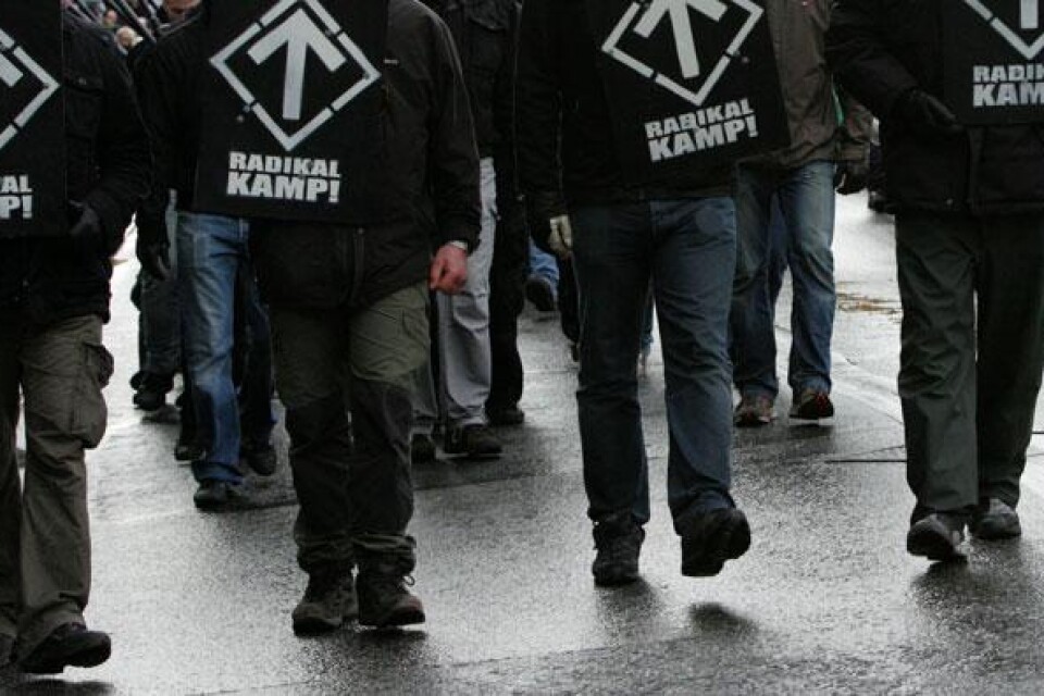 Svenska motståndsrörelsen under en demonstration i Stockholm.
