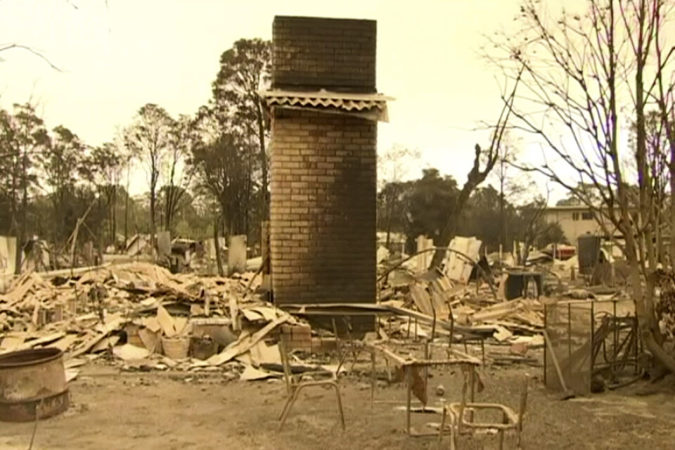 Ett nedbränt hus i Mallacoota i nordöstra Victoria.