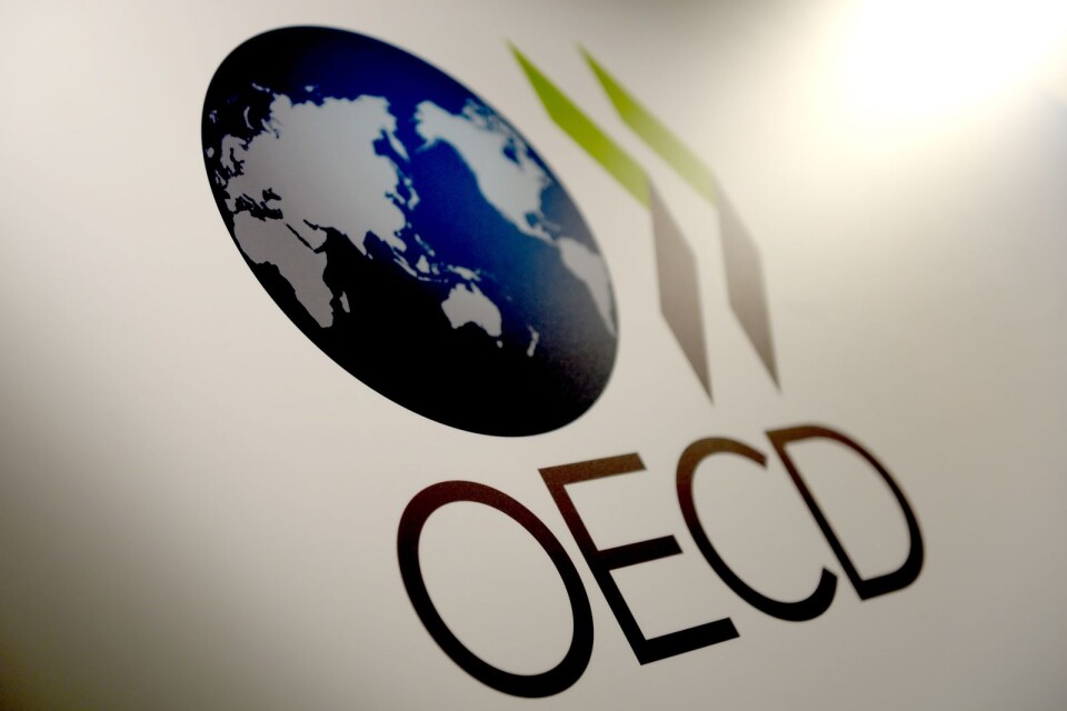 Den ekonomiska samarbetsorganisationen OECD varnar för lägre tillväxt.