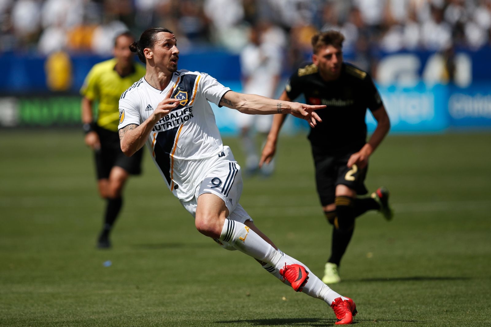 Los Angeles Galaxy's Zlatan Ibrahimovic, of Sweden, follows the play during the second half of an MLS soccer match against the Los Angeles FC Saturday, March 31, 2018, in Carson, Calif. The Galaxy won 4-3. (AP Photo/Jae C. Hong)