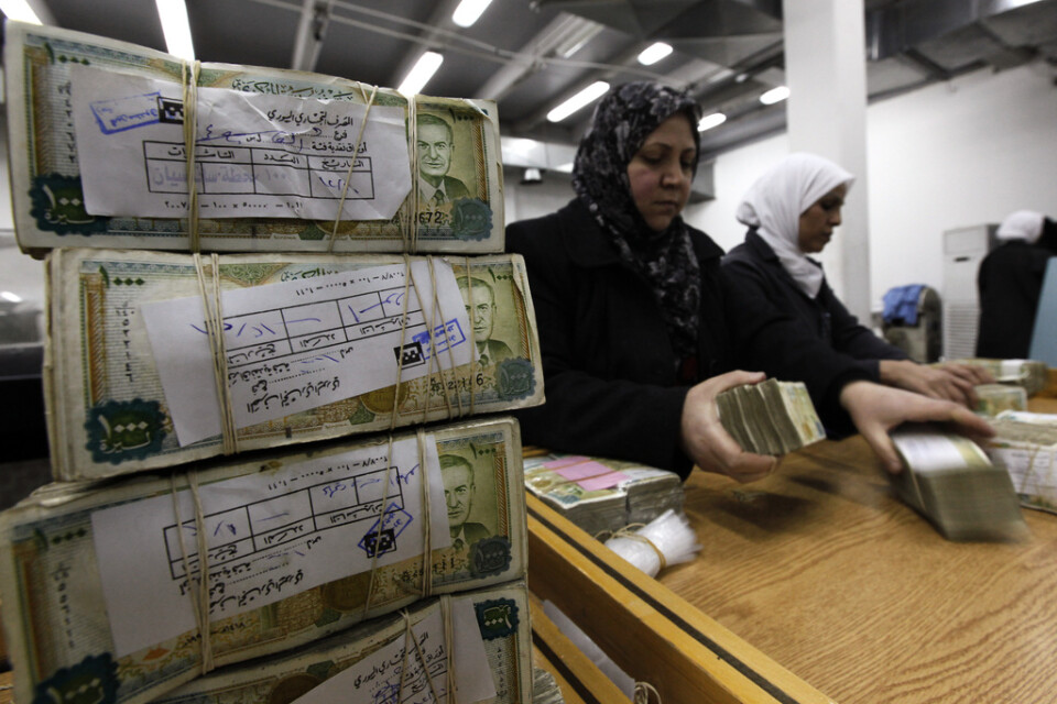 Det syriska pundet har kollapsat. Bilden är från centralbanken i huvudstaden Damaskus 2010.