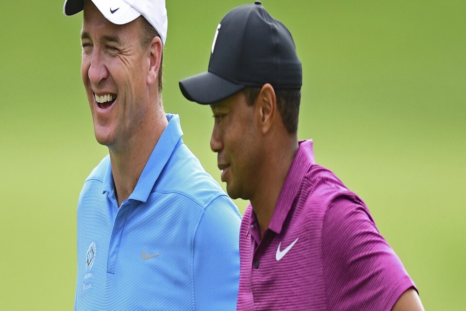 Peyton Manning och Tiger Woods har spelat golf tillsammans tidigare. Arkivbild.