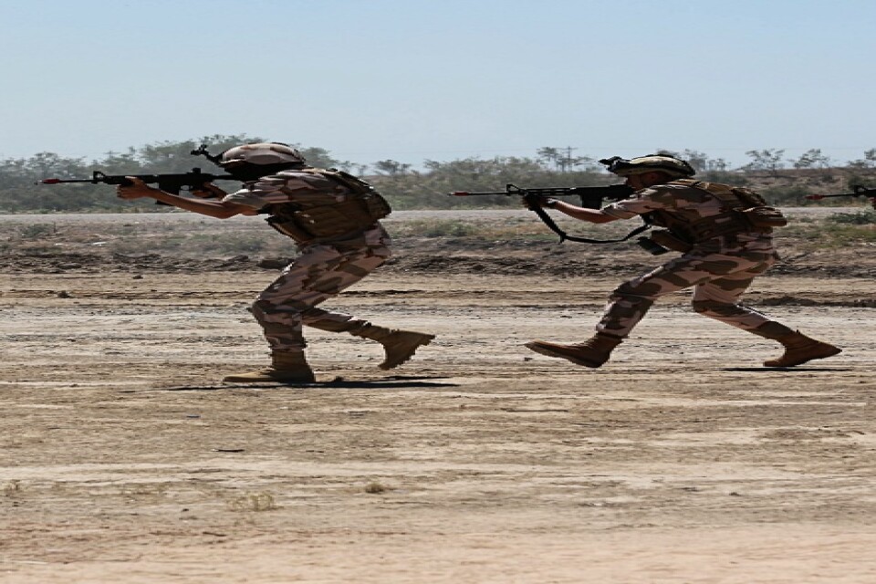 Soldater från Australien och Nya Zeeland i en träningsaktion med irakisk militär. Arkivbild.