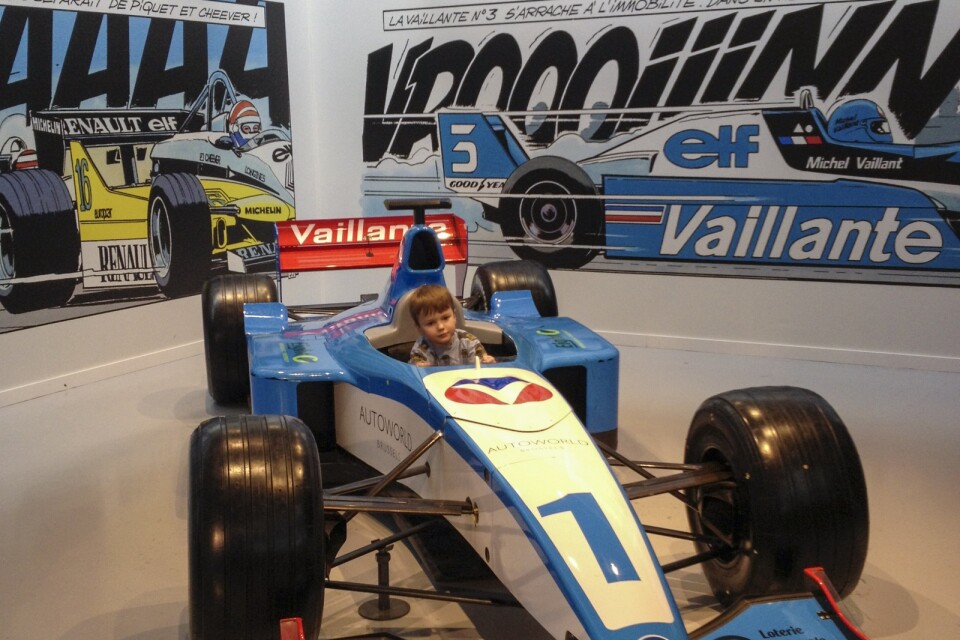 Den påhittade Formel 1-stjärnan Michel Vaillant skapades av fransk-belgiske serietecknaren Jean Graton. En riktig version av Vaillants bil finns på bilmuséet Autoworld i Bryssel.