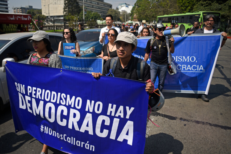 Journalister demonstrerar för pressfrihet i Guatemala city.