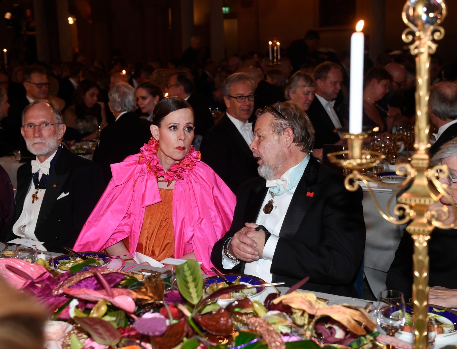 Sara Danius, tidigare ständig sekreterare i Svenska Akademien, väckte uppmärksamhet under Nobelfesten med en kreation i orange och Schiaparellirosa.