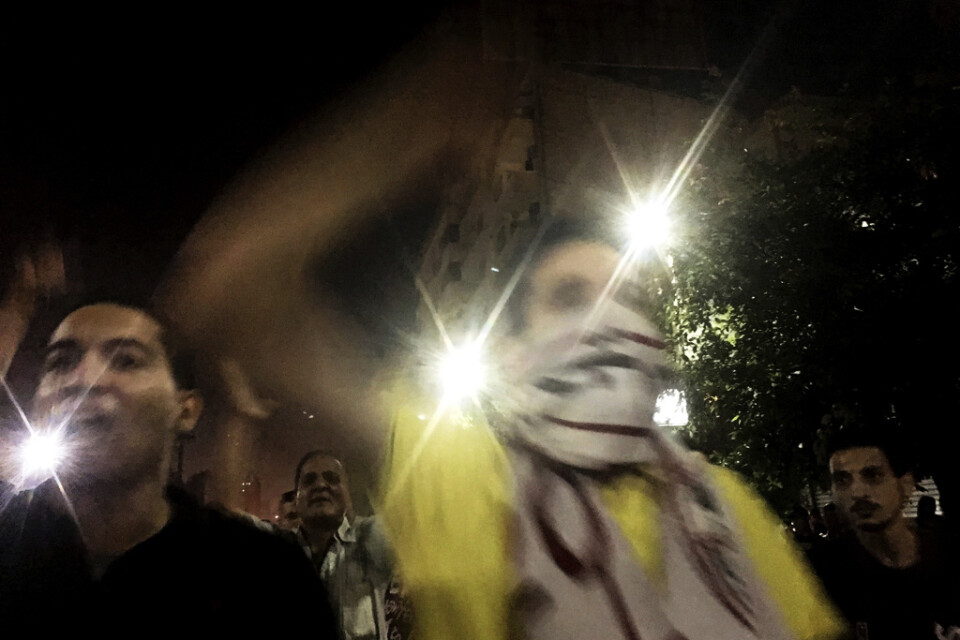 Demonstranter i Kairo under natten mot lördag.