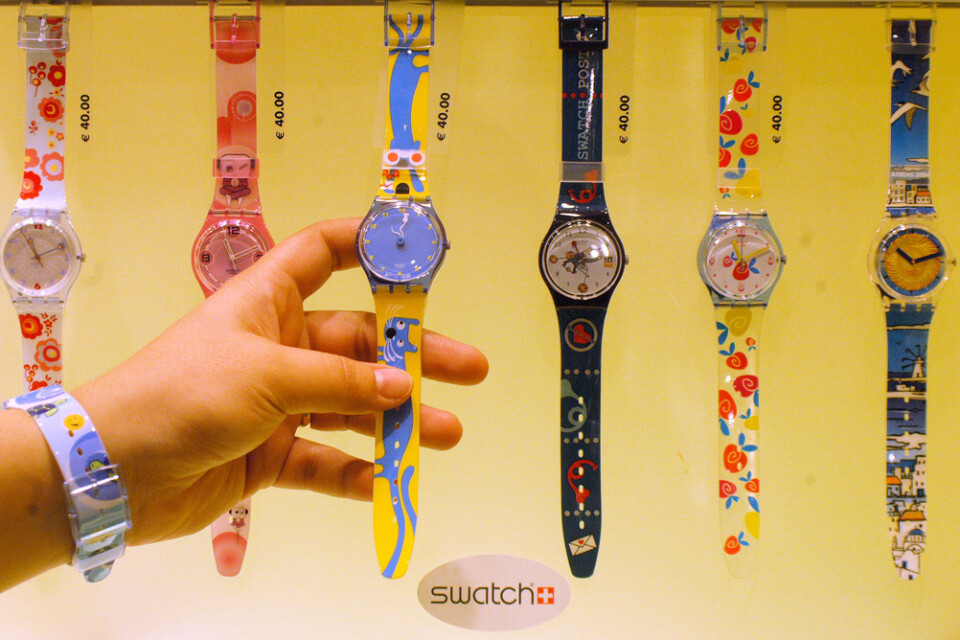 Swatch-klockor i en butik Frankfurt, Tyskland. Arkivbild.