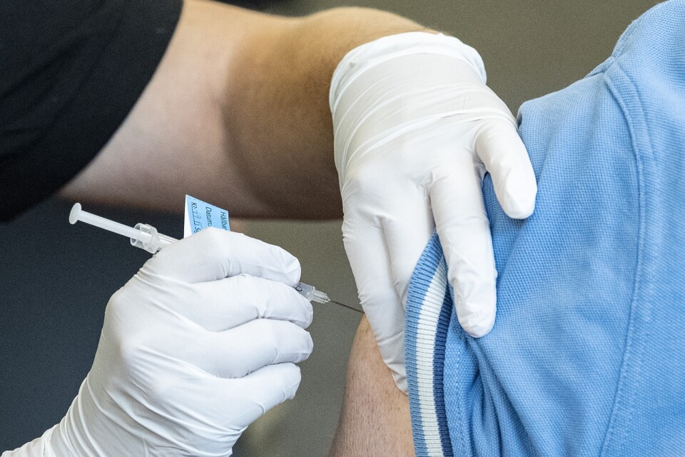 Pain when the injection is given, and a raised temperature are two of the reported reactions to the vaccination, but other conditions have been reported. Deaths have occurred.