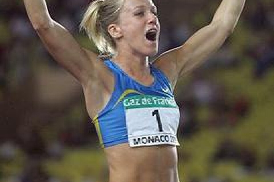 Swedish Kajsa Bergqvist celebrates after winning the high-jump competition of the IAAF World Athletics Final, 09 September 2005 at the Louis II stadium in Monaco. Bergqvist won with a 2 metre-high jump. AFP PHOTO BORIS HORVAT COPYRIGHT PRESSENS BILD Code: 444