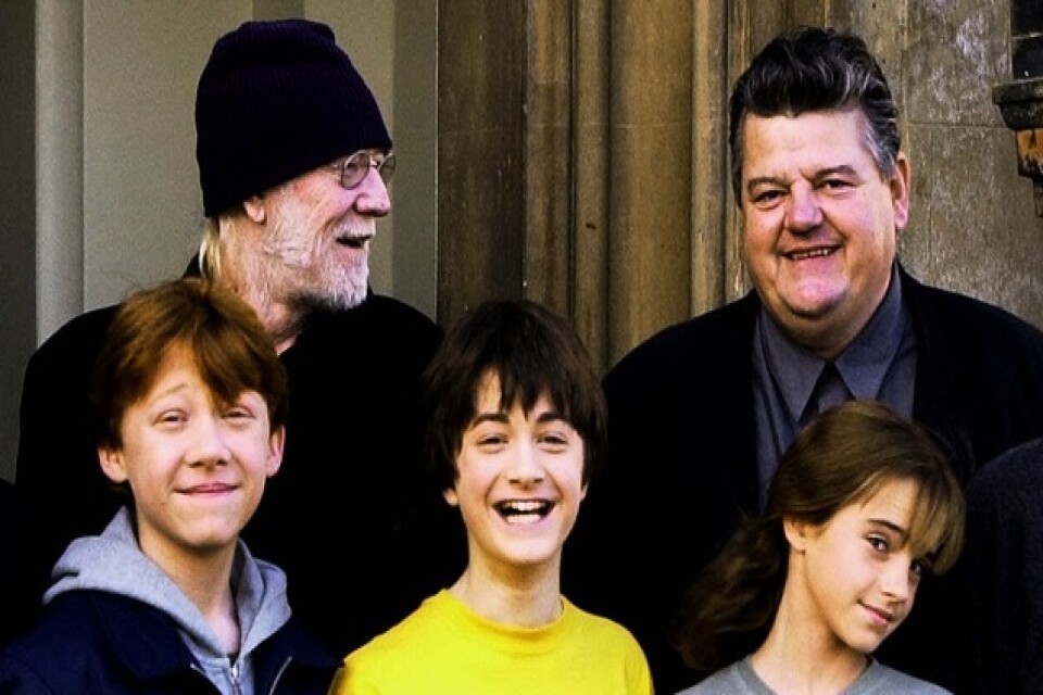 Första Harry Potter-filmen 2001. Richard Harris som spelade Dumbledore, Robbie Coltrane, Rupert Grint, Daniel Radcliffe och Emma Watson. Arkivbild.