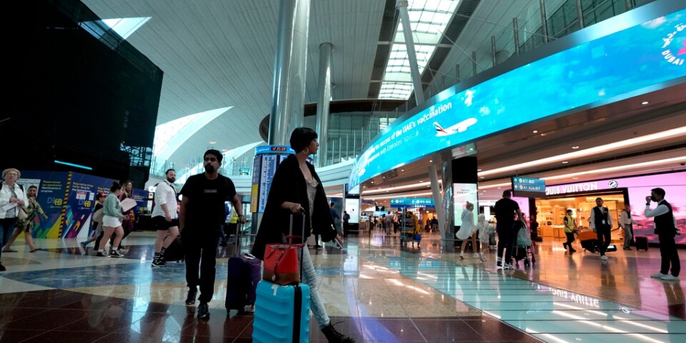 Passagerare vid terminal 3 vid Dubais internationella flygplats. Arkivbild.
