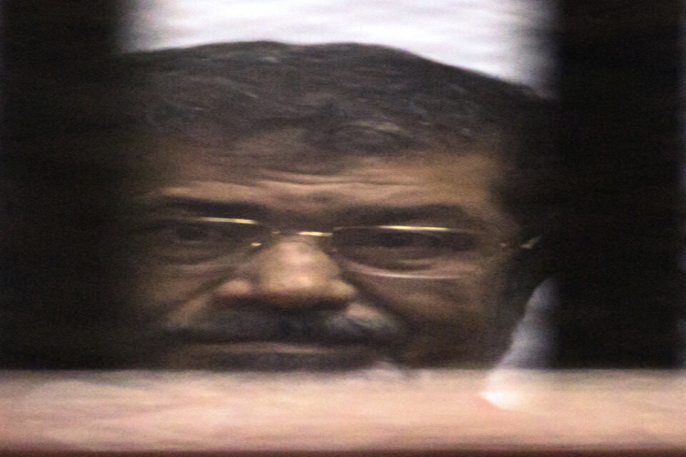 Muhammad Mursi får sin dom efter en av de rättegångar där han stod åtalad. Bilden togs i juni 2016. Arkivbild.