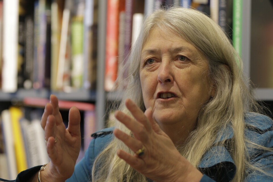 In this photo taken Wednesday, Nov. 29, 2017, British author Mary Beard gestures during an interview with the Associated Press talks about her new book 'Women in Power' in London.  A new book by classical historian Mary Beard links Greek mythology to modern Twitter trolls, arguing both have a problem with women who speak up. (AP Photo/Alastair Grant)