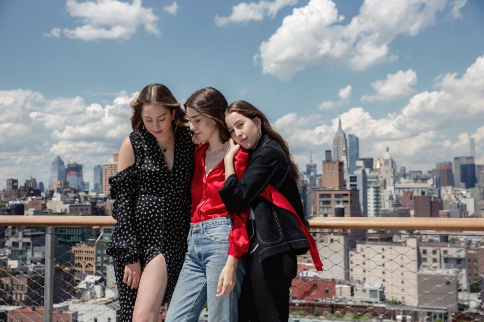 In this June 27, 2017 photo, Este Haim, from left, Danielle Haim and Alana Haim of Haim pose for a portrait  in New York to promote their latest album, ‚ÄúSomething to Tell You." (Photo by Taylor Jewell/Invision/AP)