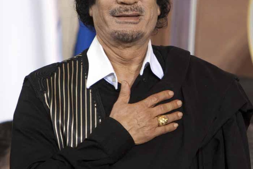 Muammar Gadaffi.