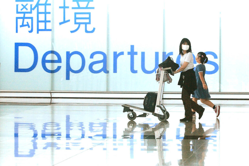 Minskningen av antalet passagerare på Hongkongs internationella flygplats Chek Lap Kok i november var den största på tio år. Arkivbild.