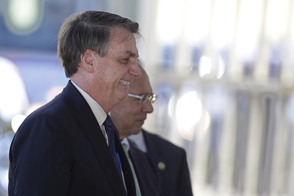 Brasiliens president Jair Bolsonaro tillsammans med ekonomiminister Paulo Guedes.