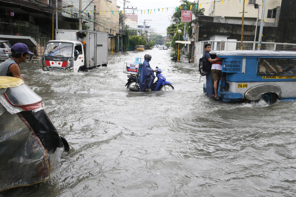 Översvämningar i Filippinernas huvudstad Manila efter kraftiga monsunregn 2018. Arkivbild.