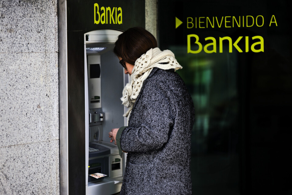 Spanska Bankia, med 60-procentigt statligt ägande, överväger en fusion med konkurrenten Caixabank. Arkivbild