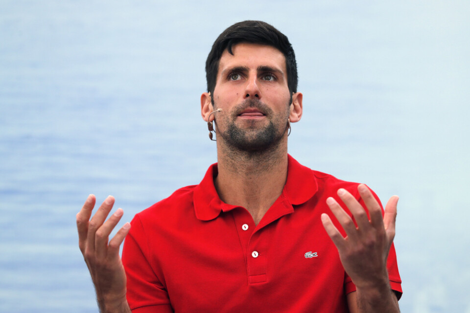 Novak Djokovic är långt ifrån övertygad om att han kommer till spel i US Open. Arkivbild.