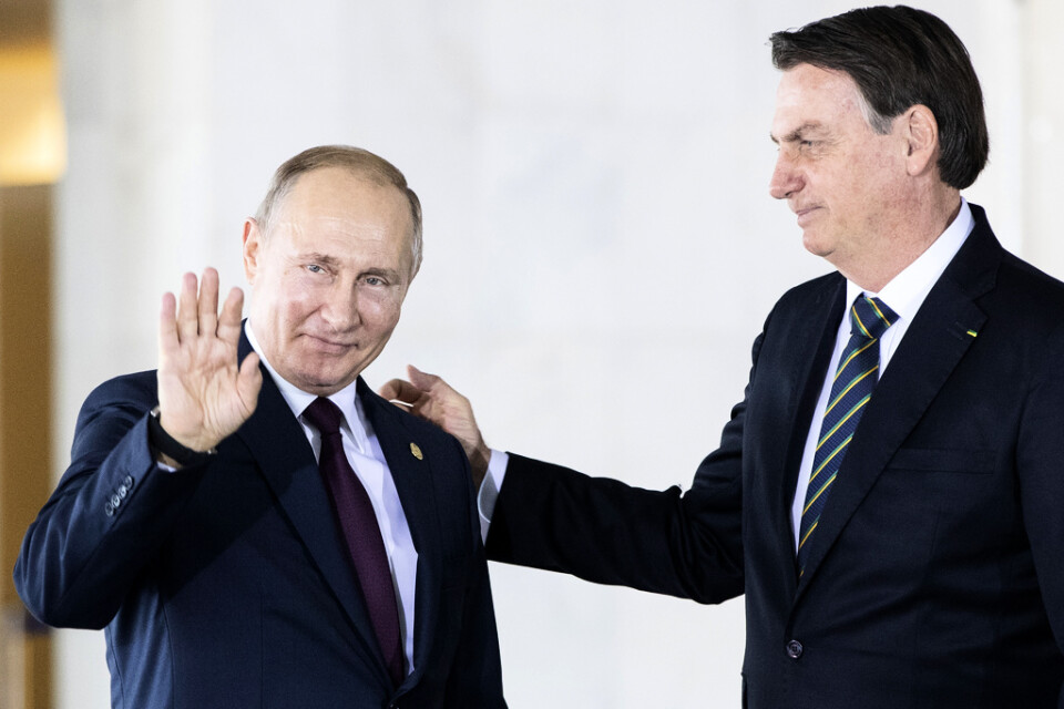 Rysslands president Vladimir Putin och Brasiliens president Jair Bolsonaro under ett möte 2019. Nu kan ett nytt möte stå för dörren. Arkivbild.