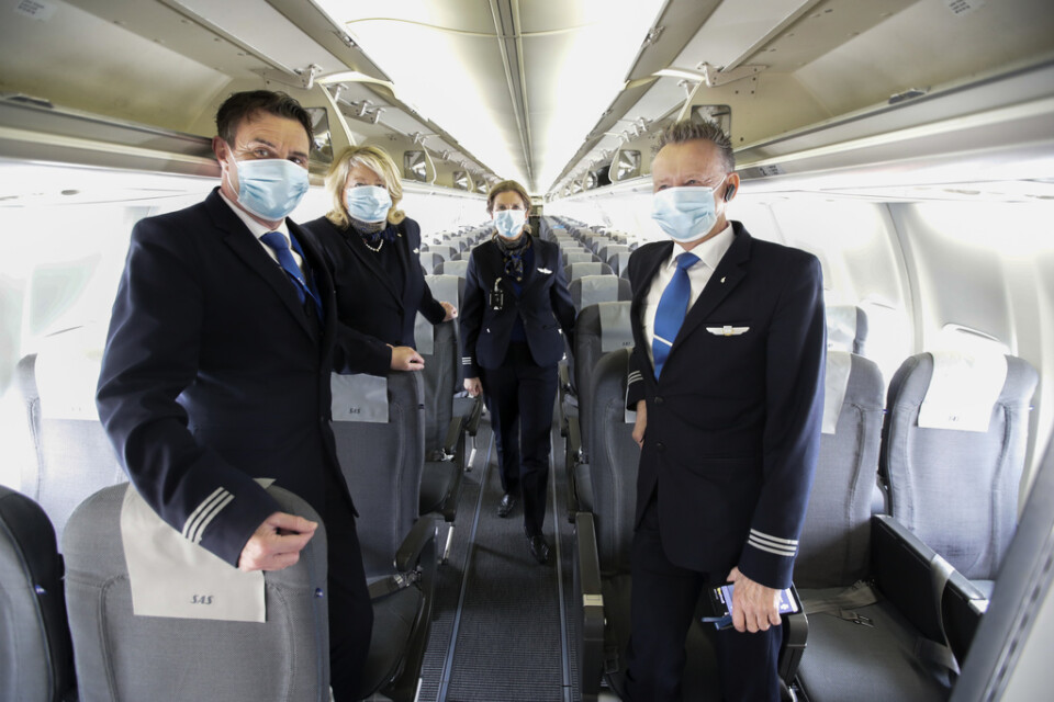Sedan den 18 maj gäller munskyddstvång för personal och resenärer från sex år och uppåt på SAS flygningar. Arkivbild.