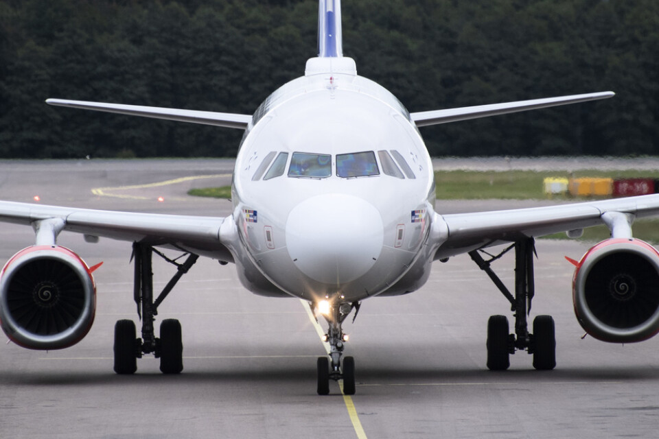En Airbus 320-200 tillhörande SAS. Flygbolaget har beslutat att minska ned antalet flighter till Hongkong.