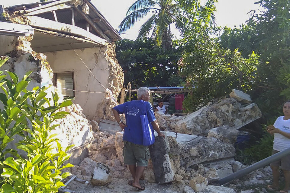 Skadade hus i staden Itbayat i provinsen Batanes.