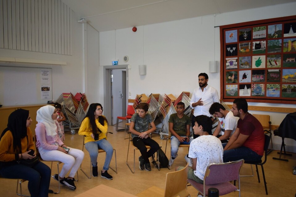 The young people sit in groups and talk about different ideas and projects they could do. They're on the Peace building course which teaches them more about non-violent communication, conflict resolution and social initiatives.