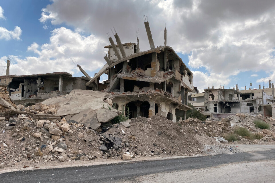 Byggnader som attackerats av regeringsstyrkor i Daraa i Syrien. Arkivbild.