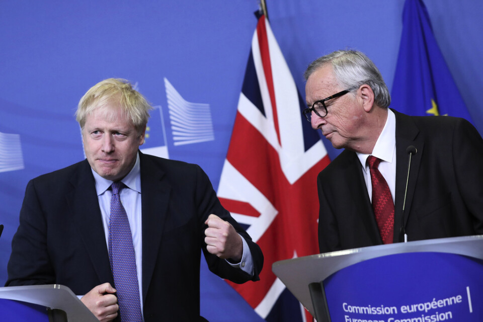 Storbritanniens premiärminister Boris Johnson tillsammans med EU-kommissionens ordförande Jean-Claude Juncker efter uppgörelsen om brexit.