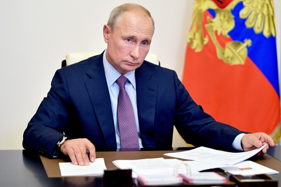 Rysslands president Vladimir Putin under fredagens videokonferens.