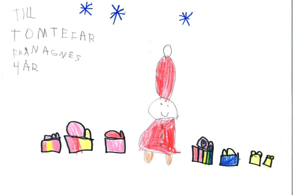 Agnes Jonasson, 4 år, i Ör har ritat denna färgrika teckningen av tomten som delar ut julklappar.