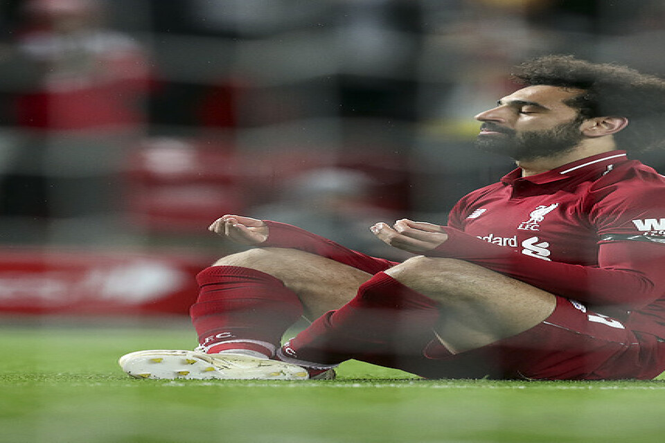 Liverpools Mohamed Salah gjorde två mål mot Huddersfield och toppar skytteligan på 21 fullträffar.