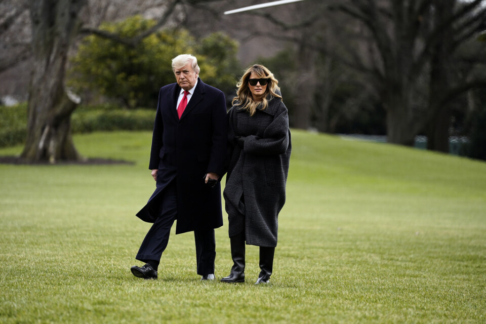 USA:s president Donald Trump och hans hustru Melania Trump då de återvände till Vita huset den 31 december efter ett besök på Trumps privata bostad Mar-a-Lago.