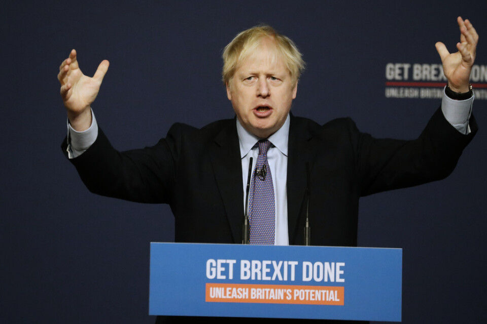 Storbritanniens premiärminister Boris Johnson presenterar Konservativa partiets valmanifest.