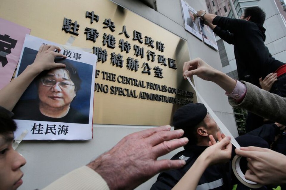 En bild från 3 januari i fjol då vänner och kolleger till Gui Minhai i Hongkong protesterade mot fängslandet.