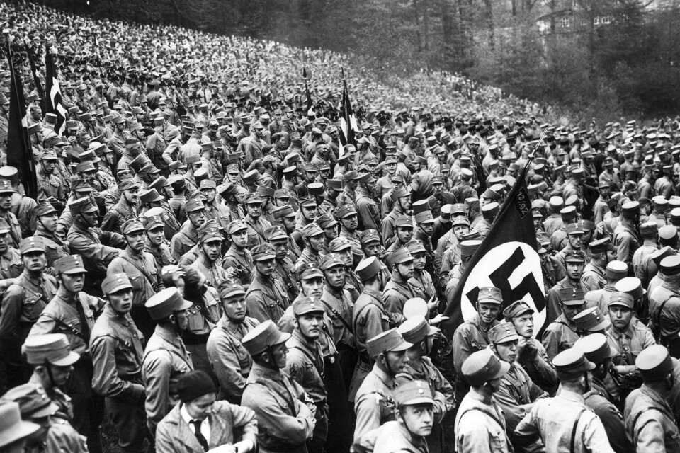 Nationalsocialister (nazister) i Tyskland förbereder sig för demonstrationsmarsch mot den sittande regeringen i oktober 1931.