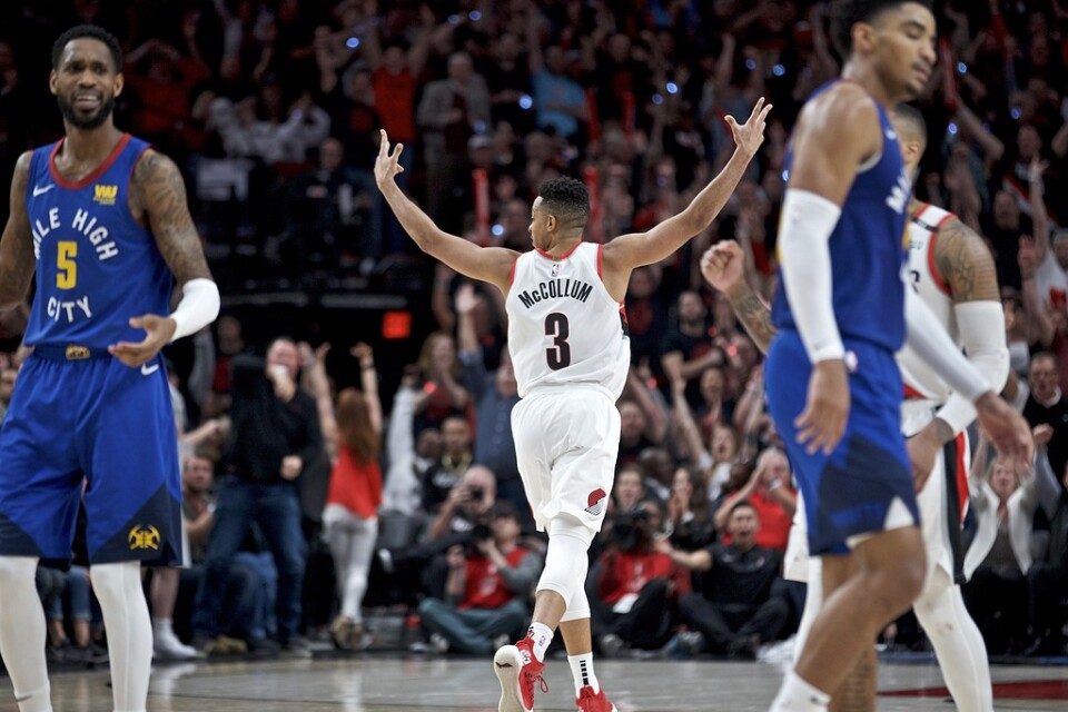 Portlands CJ McCollum jublar över en trepoängare i den historiskt långa NBA-kvartsfinalen mot Denver.